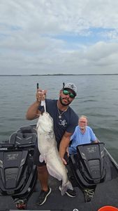 Blue catfish caught by two people in San Antonio