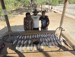 Three people fishing in San Antonio