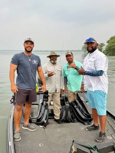 4 people fishing in TX