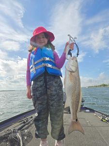 Fisherman holding a fishing rod in TX