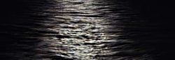 Moody glow – slick moonlit water!