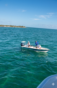 Fishing boat on turquoise waters near Islamorada Florida coastline