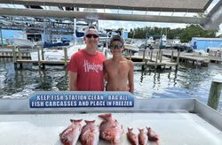 Red snapper fishing catch displayed at cleaning station in Shalimar FL marina