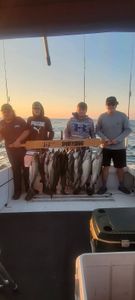 4 people fishing in NY