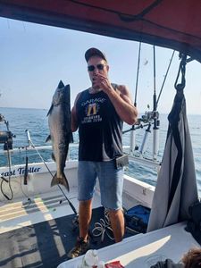 Angler with one fish caught in NY
