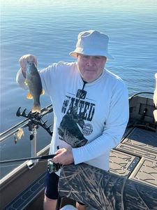 Angler holding a fish in PA