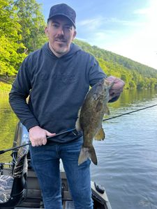 Angler holding 14-inch fish in PA