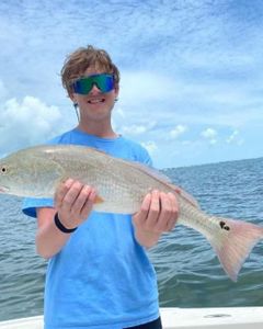 A lone angler fishing in the waters of FL