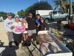 Two people fishing in FL