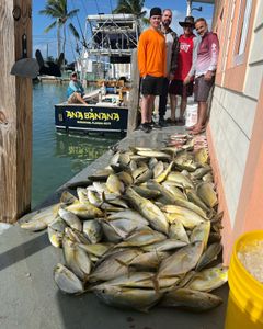 A group of 5 people fishing in Marathon