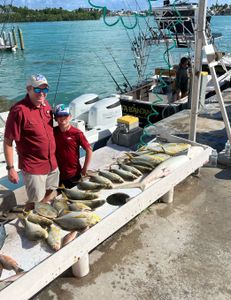 3 people enjoying fishing in Marathon, Florida