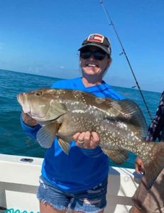Angler with big 23-inch fish caught while fishing in FL