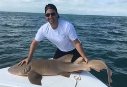 Angler posing with a 37-inch fish in FL