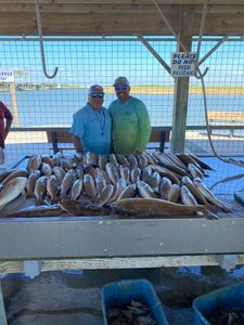 Two people fishing in Matagorda