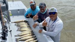 3 people fishing in TX
