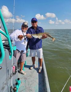 Two people fishing in Matagorda