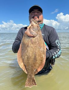 A European flounder caught while fishing in TX