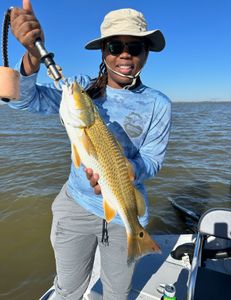 Fisherman with a big 22-inch catch in Matagorda
