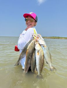 Two fishing rods with a big 17-inch catch in Matagorda
