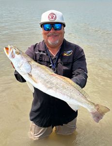 A lone angler fishing in the waters of Matagorda, Texas