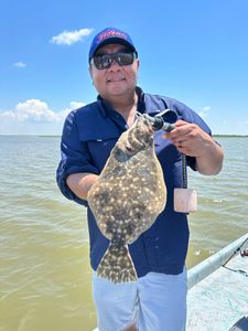 Matagorda angler with a single southern flounder catch
