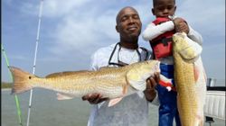 Two redfish, 27 inches long, caught on a fishing trip in TX