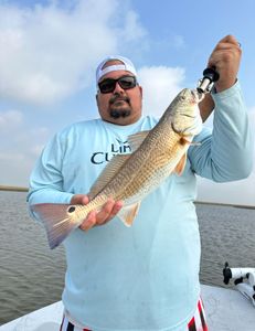 One angler with a fish in TX