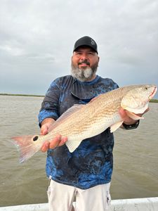 A person fishing in TX