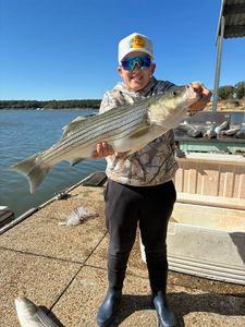 Striking image of a striped bass caught while fishing in OK.