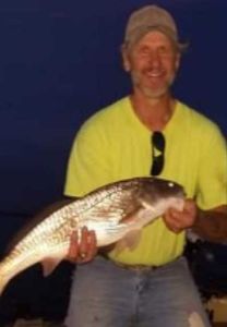 Lone fisherman reeling in catch at Brooksville