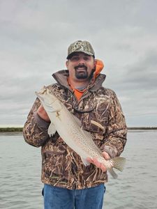 A lone angler fishing in the beautiful waters of Aransas Pass