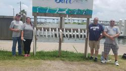 4 people enjoying a fishing, cruising, and hunting trip in TX
