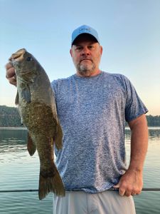 Fisherman with big fish in Branson