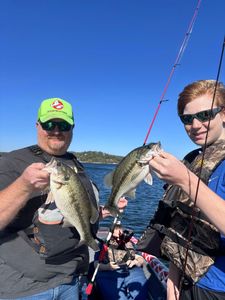 Two spotted bass fish caught while fishing in MO