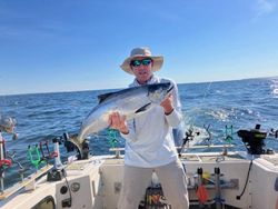 Angler with a large, 21-inch fish caught in Altmar