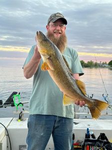 Angler with a 24-inch fish in Altmar
