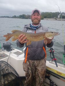 Northern pike caught fishing in Altmar NY displayed on boat