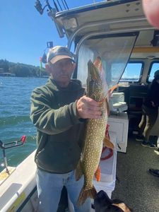 Northern pike caught while fishing on boat in Altmar NY