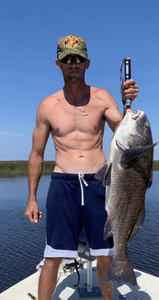 Angler holding a 29-inch fish in FL