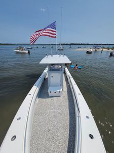 Angler fishing in the serene waters of Emerald Isle