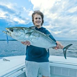 A person fishing in Hingham, with a great catch