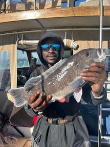 Angler with a 24-inch fish in NY