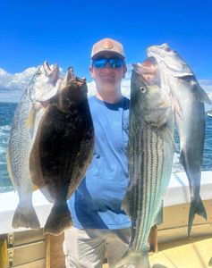 Successful fishing catch showing California Flounder and Striped Bass from Greenport NY waters
