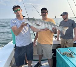 Striped bass fishing success on charter boat in Greenport NY waters