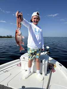 Angler with a 15-inch fish in FL