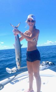 Angler catching a 23-inch fish in FL