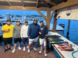 Group of 5 people fishing in Jupiter