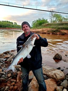 Fisherman with a 25-inch fish on Monkey Island
