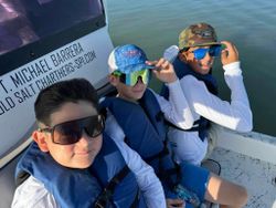 Two people fishing at Port Isabel