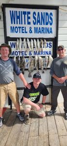 Three people fishing in TX